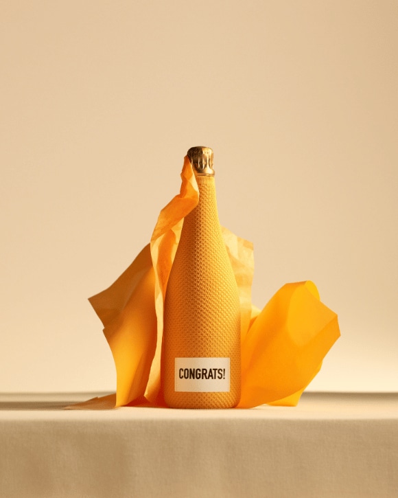 Veuve Clicquot Gifting Ice Jacket yellow with a 'Congrats' writing