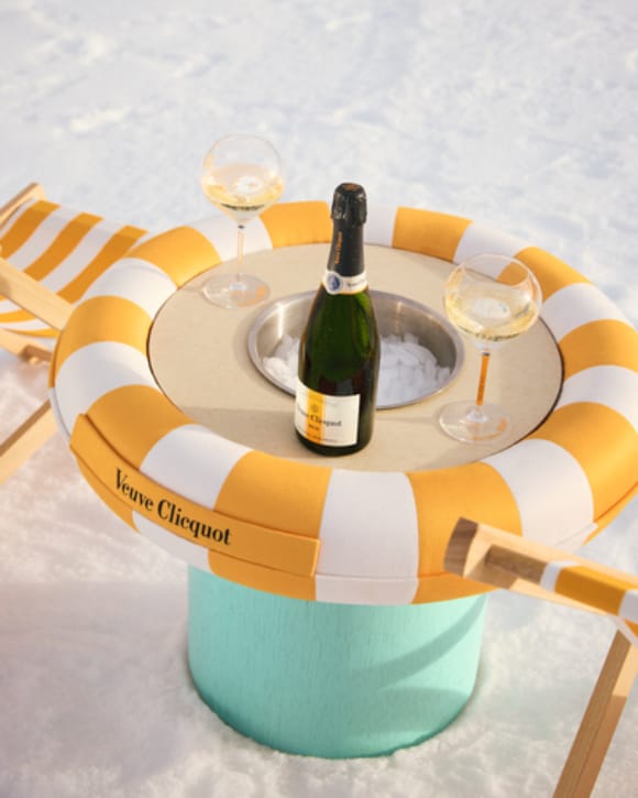 Veuve Clicquot Sun Club Aspen Bottle of RICH with a glass