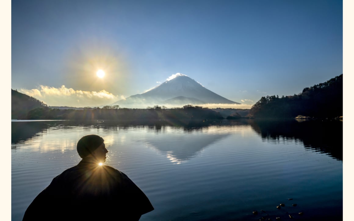 Steve McCurry photo of a man in front of Mount Fuji Steve McCurry photo of a man in front of Mount Fuji