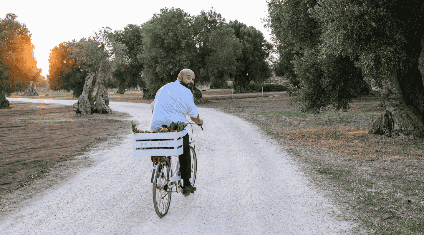 Domingo Schingaro in his garden on a bike Domingo Schingaro in his garden on a bike