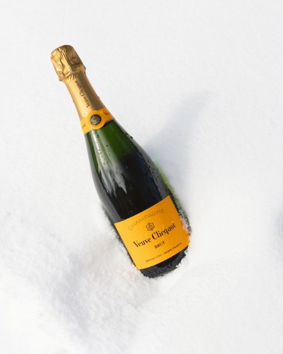 Veuve Clicquot Yellow Cooler and Brut Yellow Label champagne in the snow
