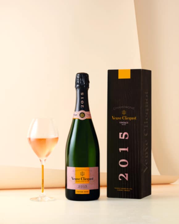 Two full glasses of ros&eacute; champagne