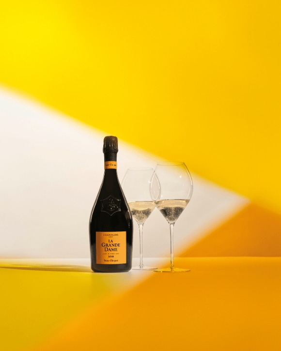 Veuve Clicquot La Grande Dame 2018 prestige cuv&eacute;e bottle and two champagne glasses