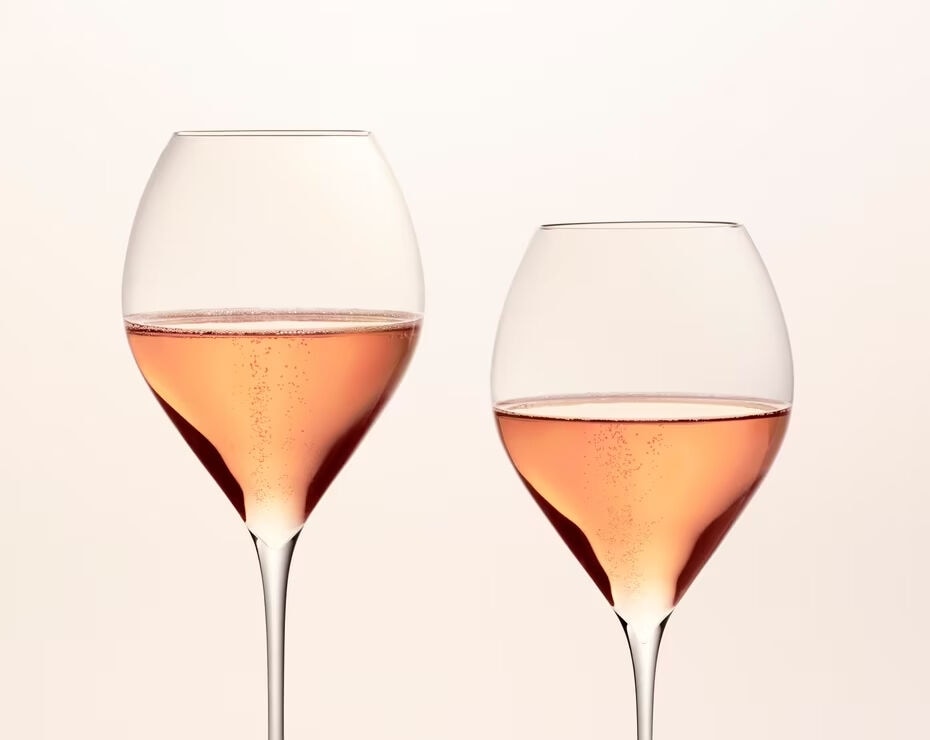 Two full glasses of rosé champagne Two full glasses of rosé champagne