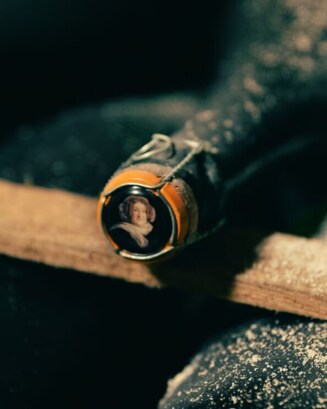 Veuve Clicquot champagne cork with 'Madame Clicquot' engraving, representing heritage and quality