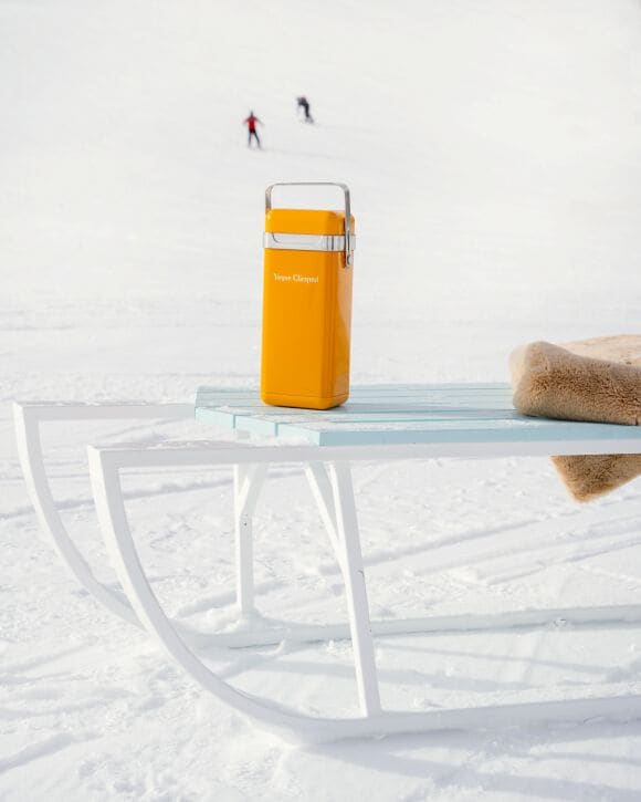 Veuve Clicquot Yellow Cooler champagne in the snow