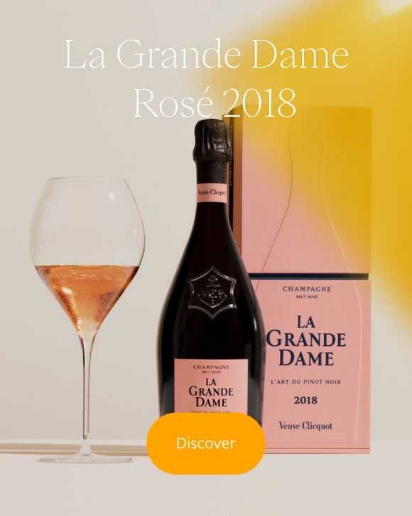 Bottle of Veuve Clicquot La Grande Dame 2018 Ros&eacute; with a glass and giftbox