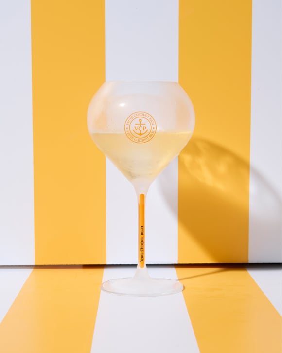 Glass of RICH champagne