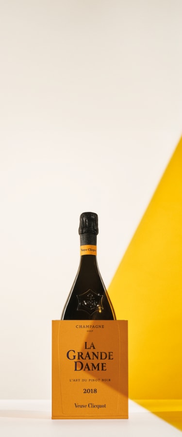 Bottle of La Grande Dame 2018 in its yellow gift box